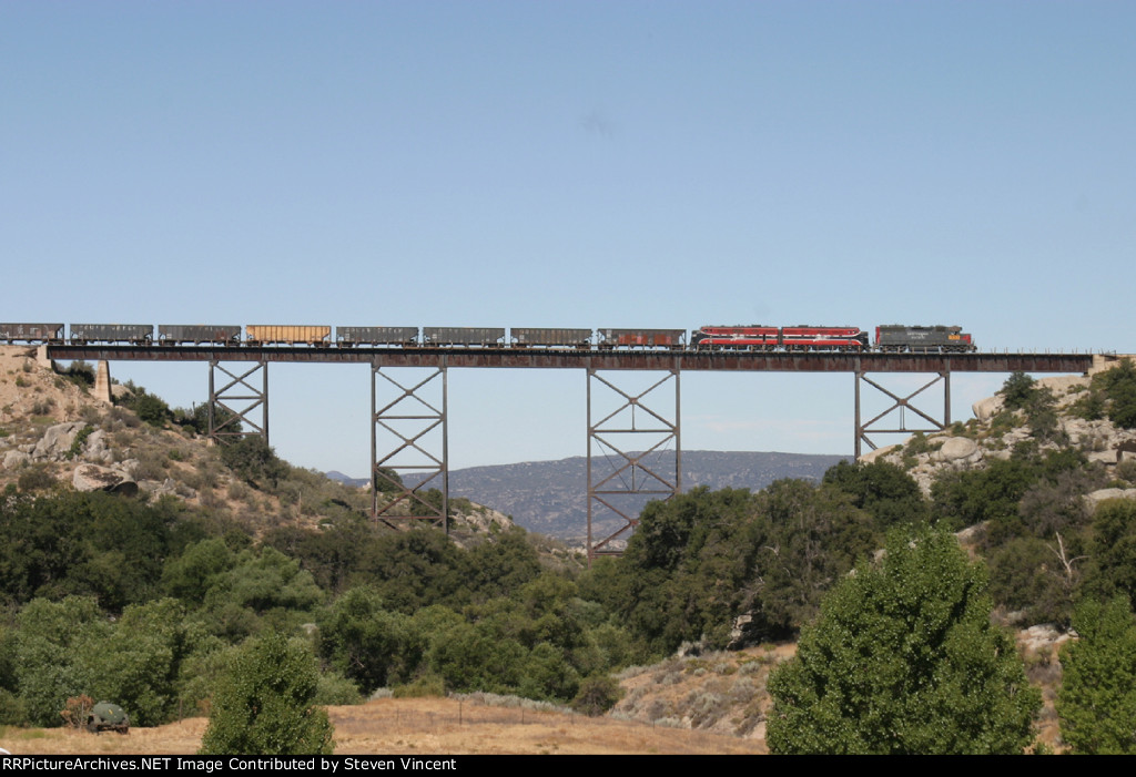 CZRY leased UP #1533 leads WCRC 102 & 100 with a sand train across Campo Creek.